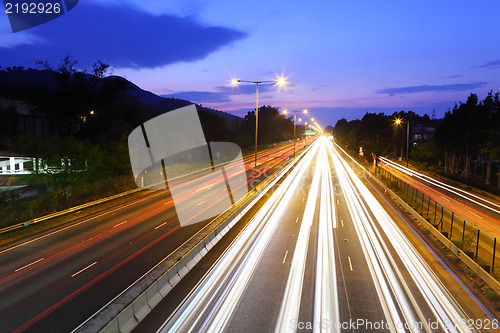 Image of traffic on highway at night