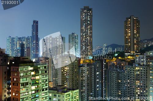 Image of apartment building at night