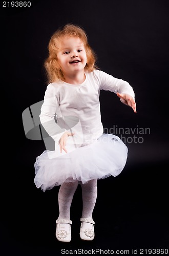 Image of 2 years old girl in white