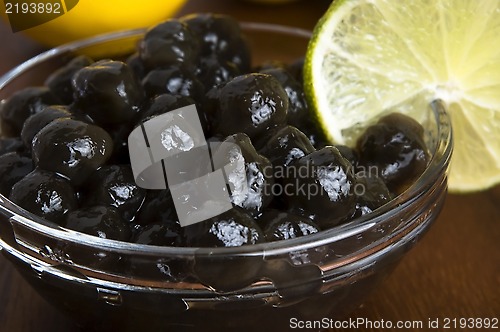 Image of tapioca pearls with lime. white bubble tea ingredients