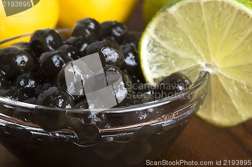 Image of tapioca pearls with lime. white bubble tea ingredients