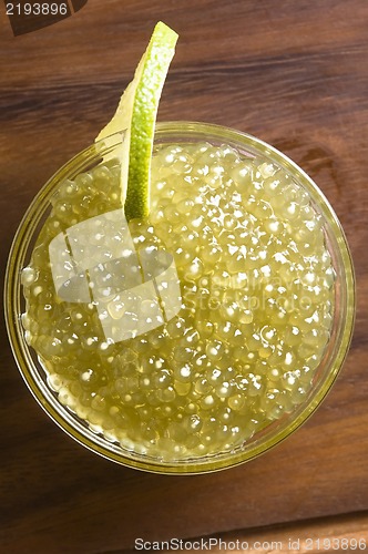 Image of tapioca pearls with lime. white bubble tea ingredients