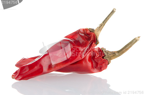 Image of Two red hot chili pepper