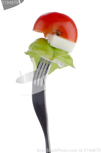 Image of Caprese salad on the fork