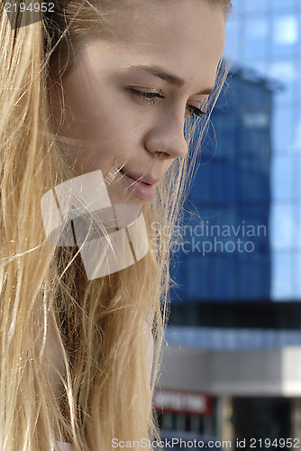 Image of face on a city background