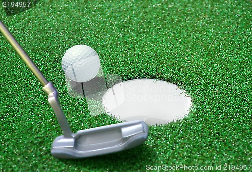 Image of golf ball on green course