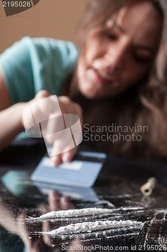 Image of Woman and cocaine