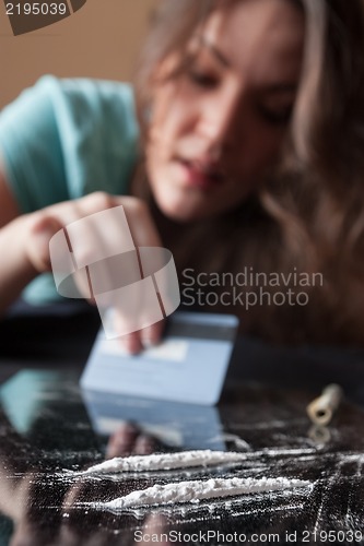 Image of Woman and cocaine