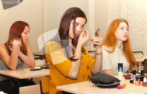 Image of girls  in the classroom during recess