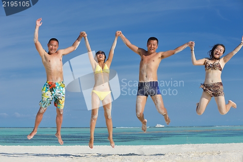 Image of group of happy young people have fun on bach
