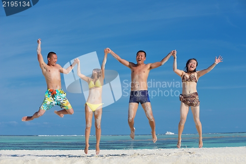 Image of group of happy young people have fun on bach