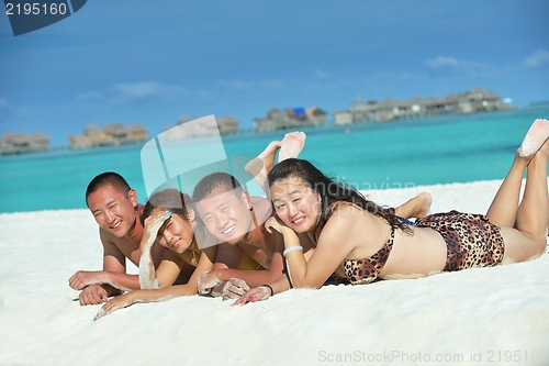 Image of group of happy young people have fun on bach