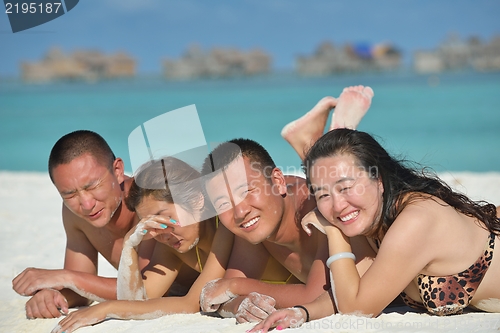 Image of group of happy young people have fun on bach