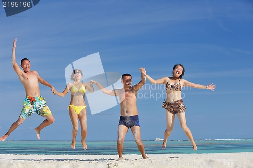 Image of group of happy young people have fun on bach