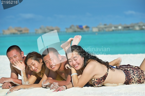 Image of group of happy young people have fun on bach