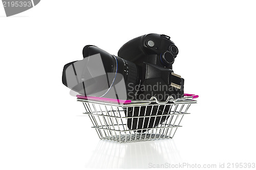 Image of Camera and lens in a shopping basket