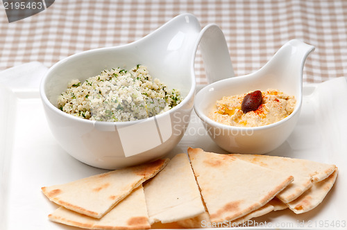 Image of taboulii couscous with hummus