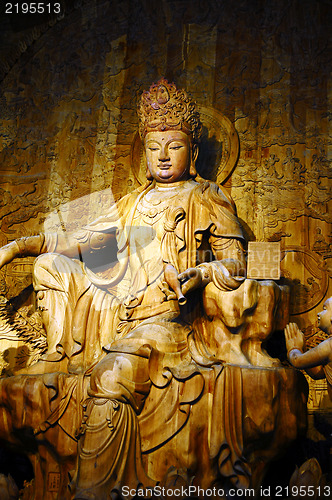 Image of Wood-carving Buddha