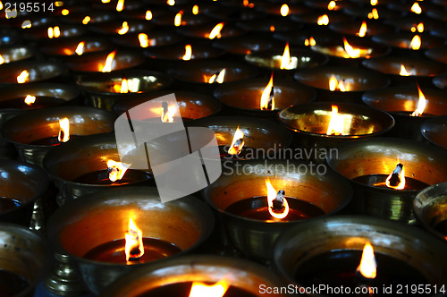 Image of Burning oil lamps