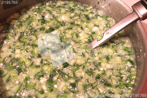 Image of dish of fresh okroshka with spoon