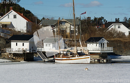 Image of Sailboat and seahouse