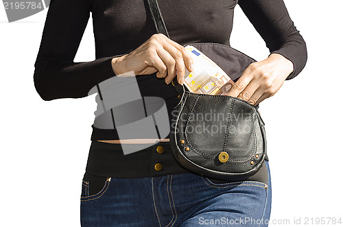 Image of Sexy lady pulls out of her handbag a banknotes of 50 euro isolated on white
