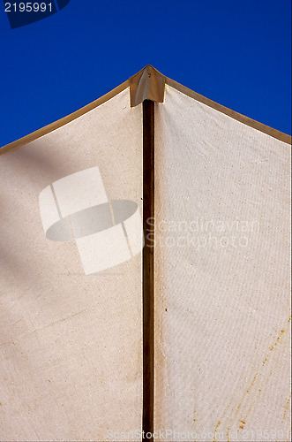 Image of abstract parasol and blue sky