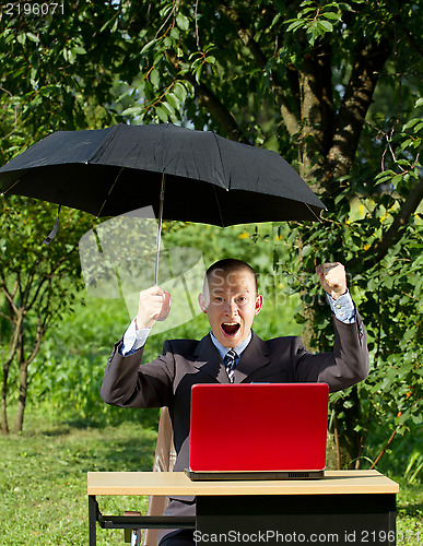 Image of Businessman Working Outdoors
