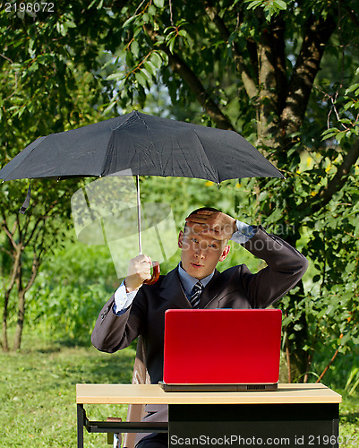 Image of Businessman Working Outdoors