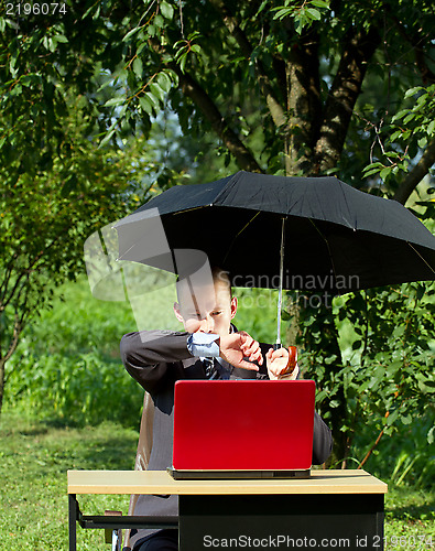 Image of Businessman Working Outdoors