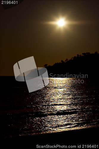 Image of gold  sunset   and coastline