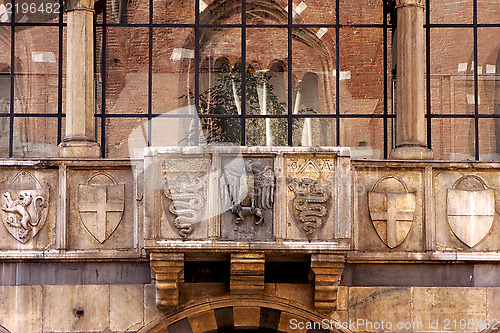 Image of reflex of piazza dei mercanti milan