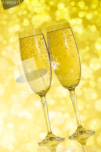 Image of Champagne  on the yellow background