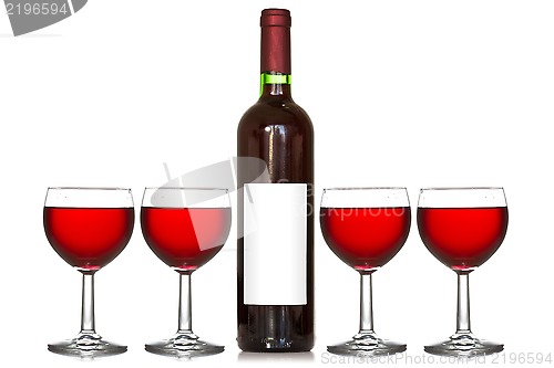 Image of Four wineglass and wine bottle