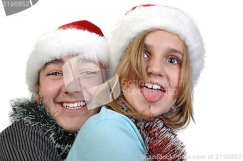 Image of  happy brother and sister celebrating Christmas