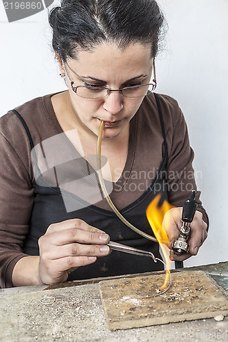 Image of Portrait of a Female Jeweler Working