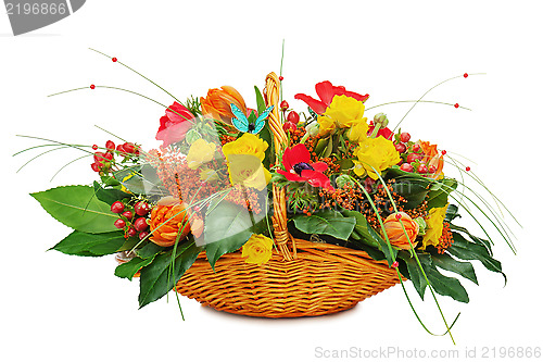Image of Flower bouquet arrangement centerpiece in a wicker gift basket i