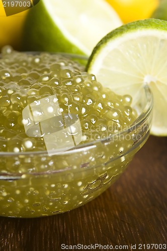 Image of tapioca pearls with lime. white bubble tea ingredients