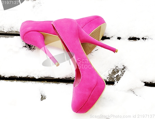 Image of Pink shoes in snow
