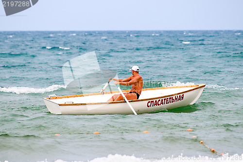 Image of The rescuer in a boat