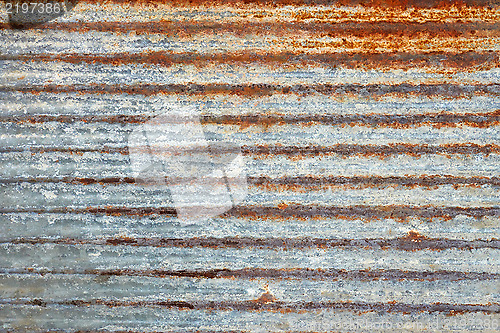 Image of Ribbed metal plate with shelled paint
