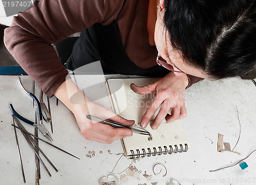Image of Female Jeweler Working