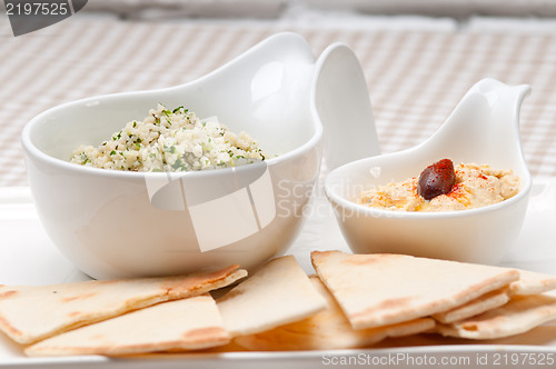 Image of taboulii couscous with hummus