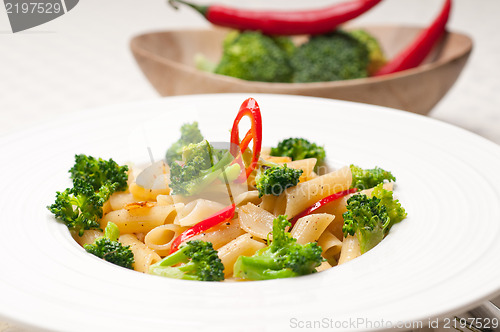 Image of Italian penne pasta with broccoli and chili pepper
