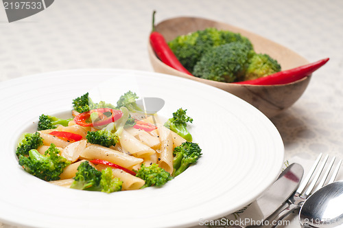 Image of Italian penne pasta with broccoli and chili pepper