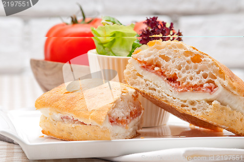 Image of ciabatta panini sandwich with parma ham and tomato