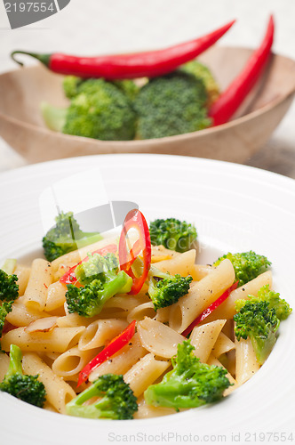 Image of Italian penne pasta with broccoli and chili pepper