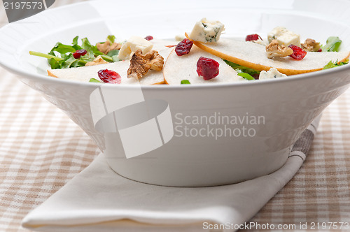 Image of Fresh pears arugula gorgonzola cheese salad