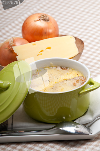 Image of onion soup with melted cheese and bread on top