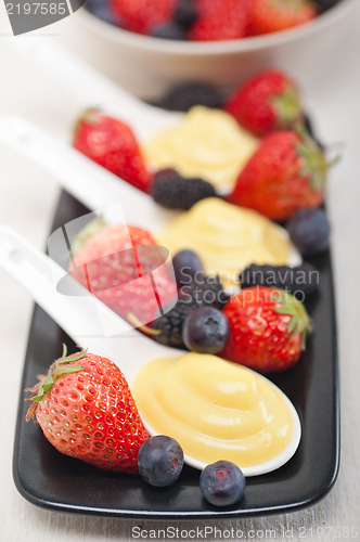 Image of custard pastry cream and berries